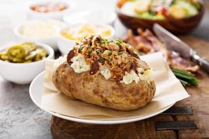 Baked potato with pulled pork photo