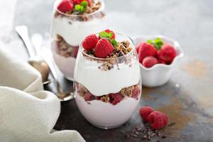 Yogurt parfait with raspberry and granola photo