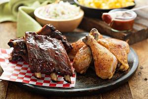 Grilled or smoked ribs and chicken photo