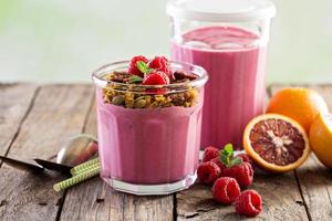 Healthy orange and raspberry smoothie photo