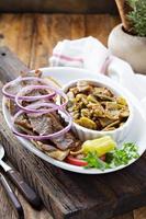 Gyro plate with meat on a pita photo