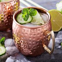 Moscow mule cocktail with lime and cucumber photo