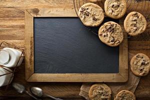 Homemade chocolate chip cookies with milk photo