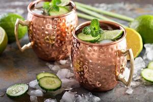 Moscow mule cocktail with lime and cucumber photo