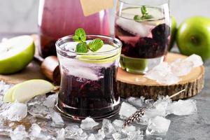 Refreshing cocktail with blackberry and lavender photo