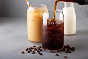 Cold brew iced coffee in glass bottles photo