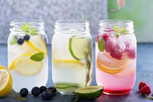 Variety of lemonade in jars photo
