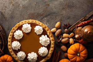 Pumpkin pie with whipped cream photo