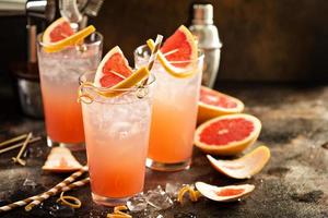 Grapefruit cocktail in tall glasses photo