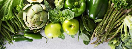 Variety of green vegetables and fruits photo