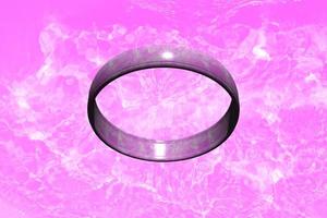 A pink ring made of watercolor on a pink water surface. Valentine watercolor. Love water day. Pink water splashes with shining. photo