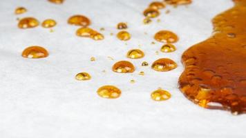 amber cannabis resin macro marijuana extract dab with high thc photo