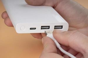 hand connect usb for white portable  power bank photo