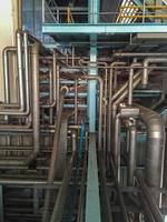 Stainless steel water pipe for delivering water to the production process. photo