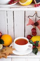 Tea with cookies and oranges for Christmas photo