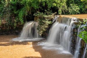 Waterfall in deep forest of Thailand photo