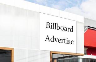 Mock up billboard on white building photo