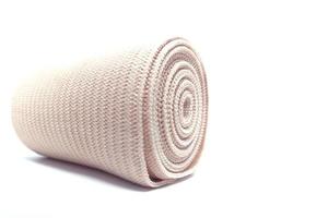 Medical Elastic bandage roll for first aid isolated on white background photo