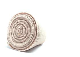 Medical Elastic bandage roll for first aid isolated on white background photo