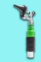 Otoscope for doctor use to exam the ears, Medical equipment for physical examination, White background photo