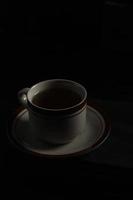 Cup tea isolated on a black background photo