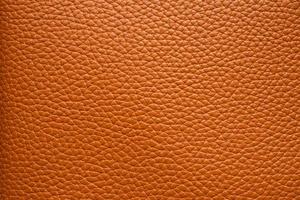 Brown leather texture background close up photo
