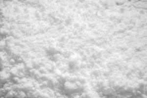 White snow texture background high angle view photo