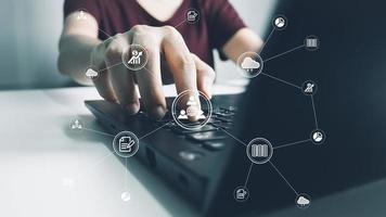 Concept global data connection with internet technology, users are using labtop for online transactions by internet technology, big data, database management, cloud computing, cashless society. photo