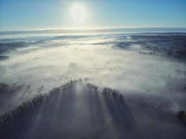Top view aerial shot of foggy Polish village photo