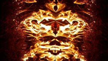 A beautiful flame shaped as imagined. like from hell, showing a dangerous and fiery fervor, black background. photo