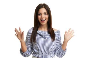 Caucasian brunette woman having fun and smiling isolated over white background photo