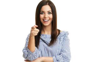 Caucasian brunette woman having fun and smiling isolated over white background photo