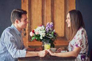 Romantic couple dating in restaurant photo