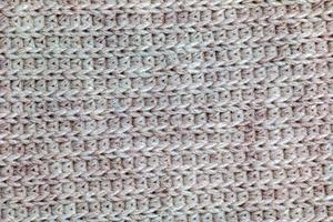 Texture of knitted wool fabric for wallpaper and abstract background. photo