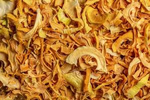 Dried onion or crunchy crunchy onion chips. Traditional seasoning in various culinary recipes. Food background. photo