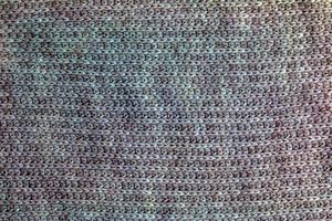 Texture of knitted wool fabric for wallpaper and abstract background. photo