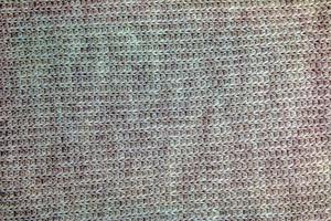Texture of knitted wool fabric for wallpaper and abstract background. photo