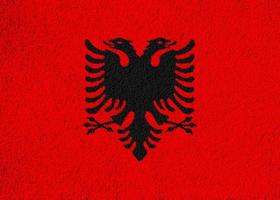 Albania flag on a textured background. Concept collage. photo