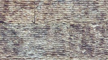 Sawn along tile pattern wall texture seamless loop. Stones rock tile background. video