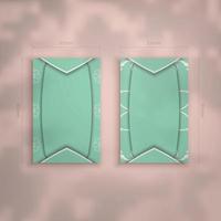 A mint colored business card with a vintage white pattern for your contacts. vector