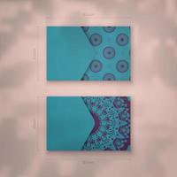 Business card in turquoise color with a luxurious purple pattern for your business. vector