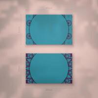 Presentable business card in turquoise color with luxurious purple pattern for your personality. vector