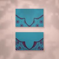 Business card template in turquoise color with abstract purple ornament for your contacts. vector