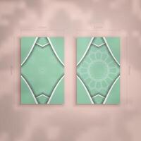 Mint color business card with Greek white pattern for your brand. vector