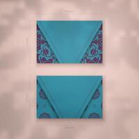 Turquoise business card with purple mandala pattern for your brand. vector