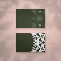 Dark green business card with abstract white pattern for your brand. vector