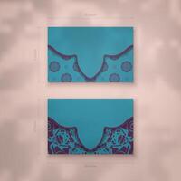 Business card in turquoise color with a vintage purple pattern for your contacts. vector