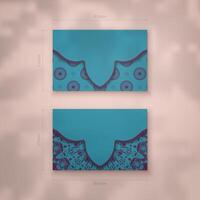 Presentable business card in turquoise color with abstract purple pattern for your contacts. vector