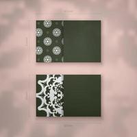 The business card is dark green with an abstract white ornament for your contacts. vector