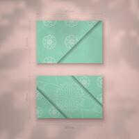 Mint color business card with abstract white ornament for your brand. vector